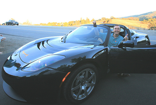 The sleek and green Tesla Roadster.  Photo by Jurvetson