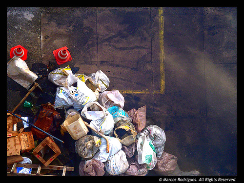 In 2003 Americans dumped about 130 million tons of garbage into local landfills.  This waste contaminates the air, the soil, and the water supply.  Photo by Andarilho Belem via Flickr
